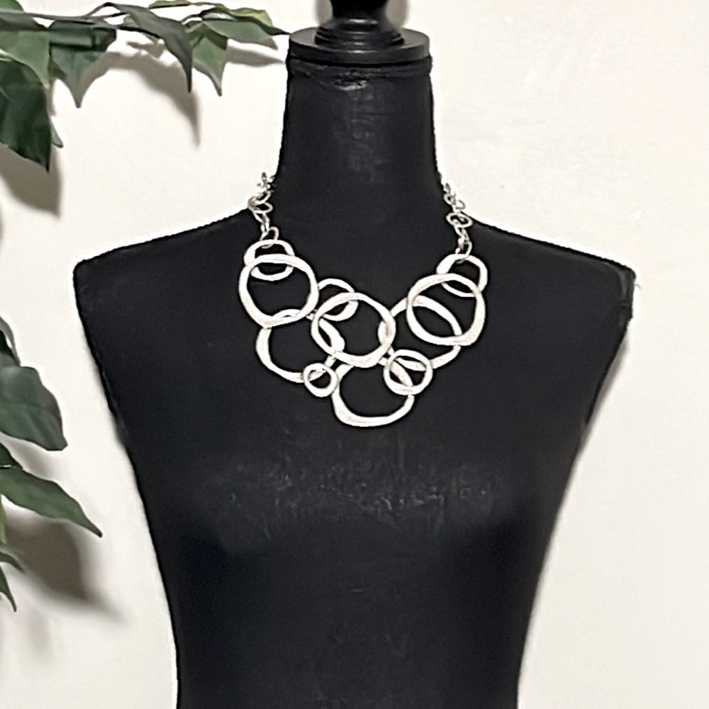 Karma Bella silver tone necklace. Approx 18” plus a 3” extender chain. Like new.